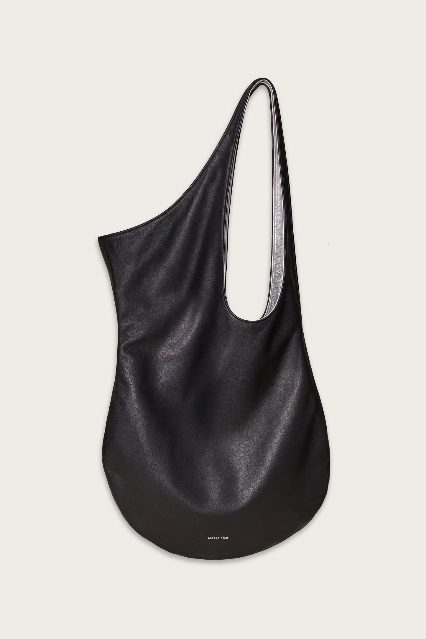 REVERSIBLE PETAL TOTE in black and silver